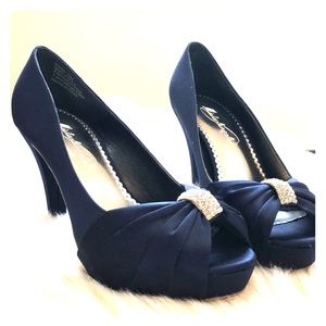Satin Navy blue pumps.